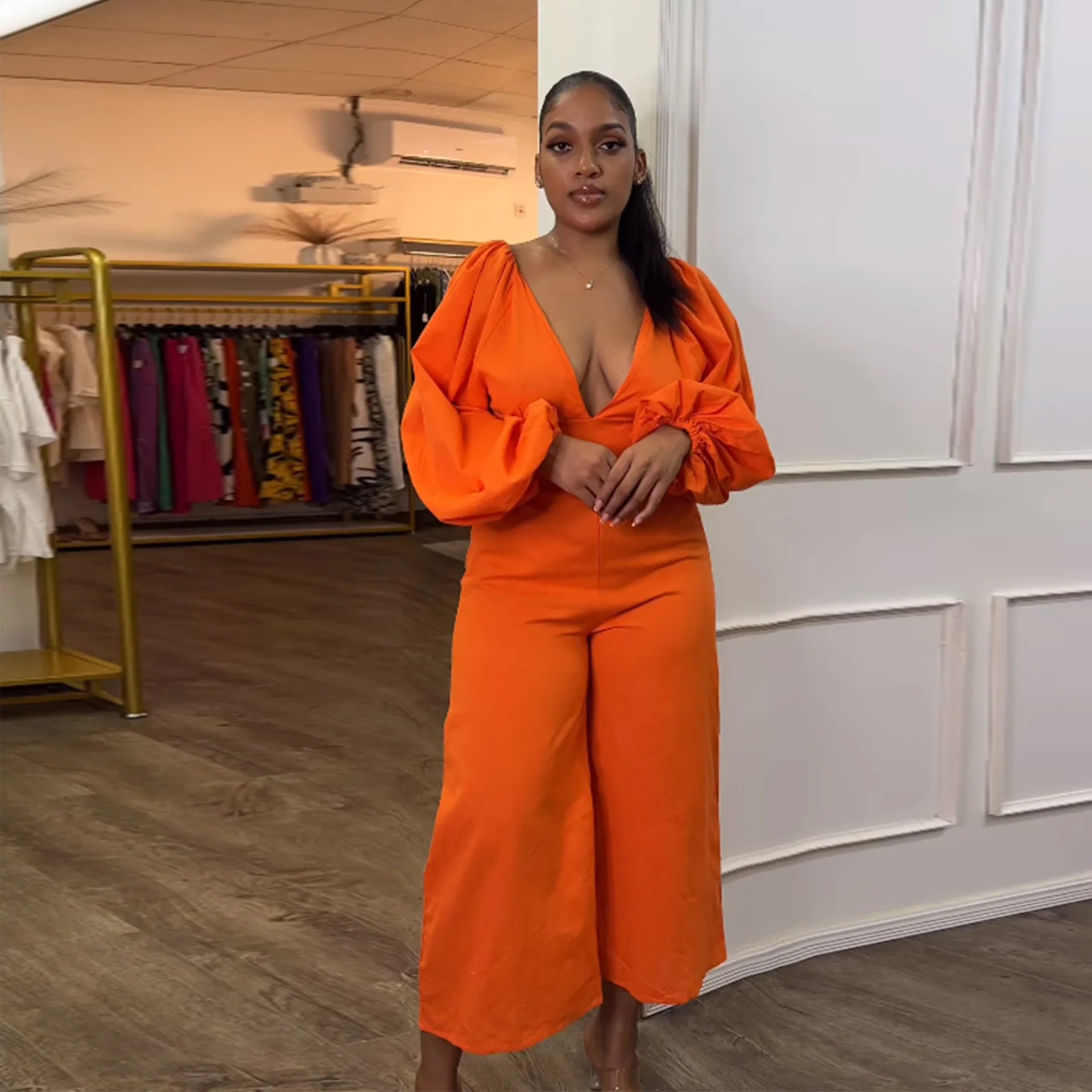 Early Bird Discount Z172061 2023 orange long sleeve sexy woman bodysuit ladies Slim-Fit Deep V Backless Strap puff Sleeve Wide Leg jumpsuit